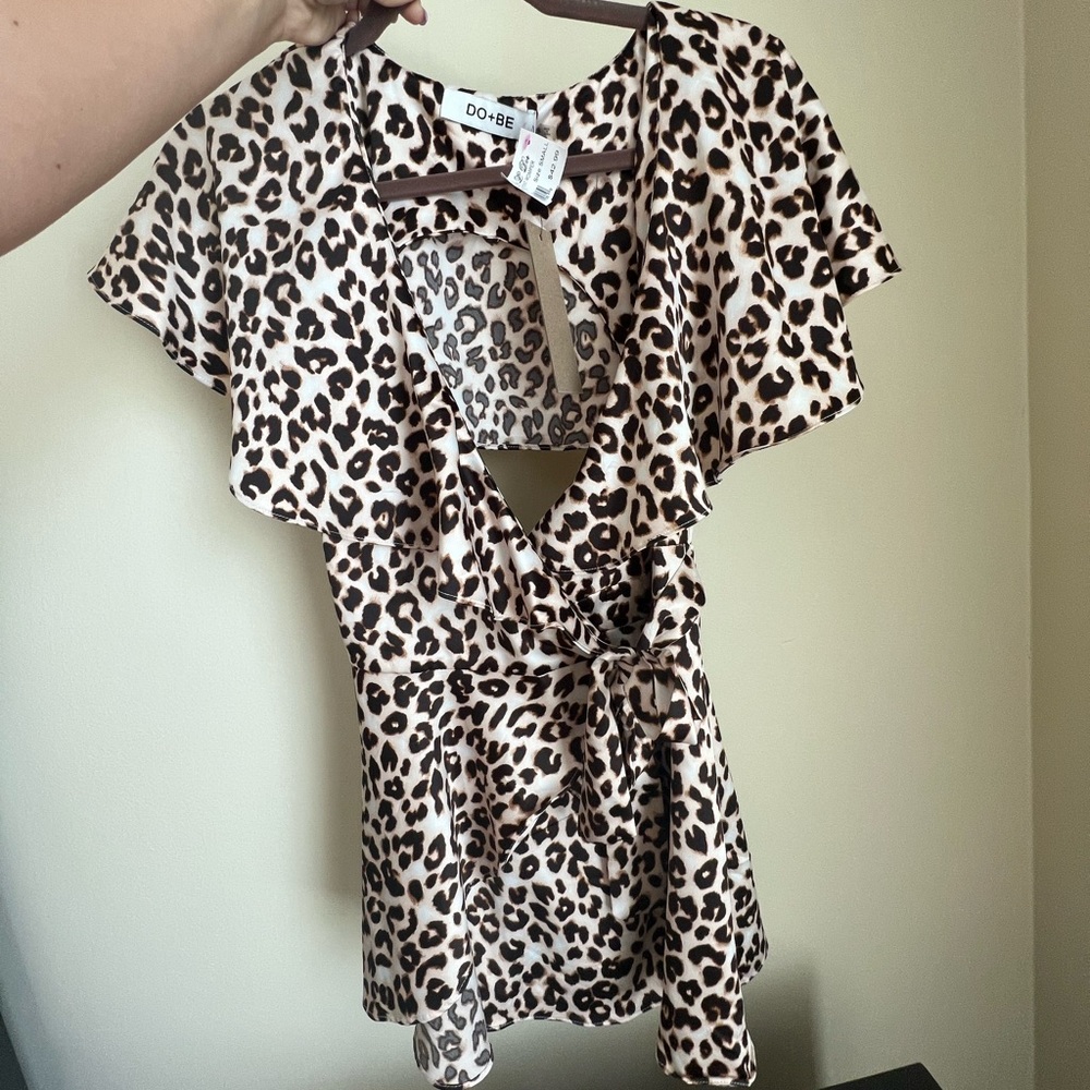 Cheetah print wrap tie romper, size small.